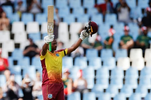 Losing cause: West Indies' Johnson Charles celebrates after scoring his century 