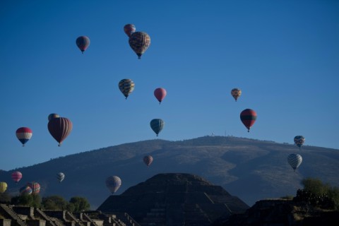 Hot-air balloons are seen flying over the Teotihuacan archeological site, not far from Mexico City, in March 2023