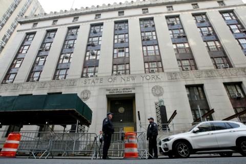 Police guard the Manhattan District Attorney's Office in New York City, where former US president Donald Trump is expected to surrender on April 4, 2023 to face charges related to a hush-money case