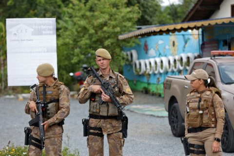 Security forces guard the preschool where an attacker killed four children in Blumenau, Brazil, on April 5, 2023