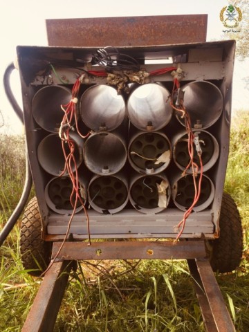 A photograph released by the Lebanese army shows the multiple tocket launcher found by troops in an olive grove near the border with Israel