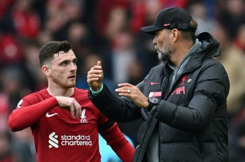 Liverpool defender Andrew Robertson talks to Reds boss Jurgen Klopp