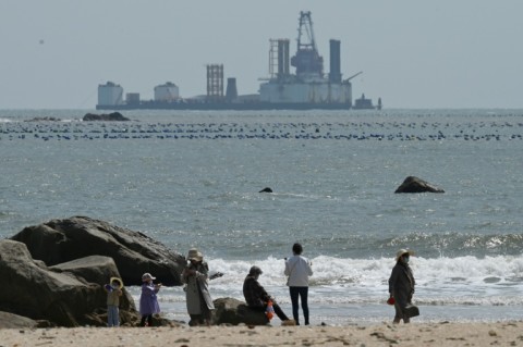 Tourists on Sunday were wandering the beaches of Pingtan, where live-fire exercises were slated for the following day