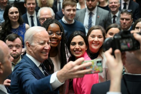 Biden posed for selfies with students after his speech at the new Ulster University campus in Belfast