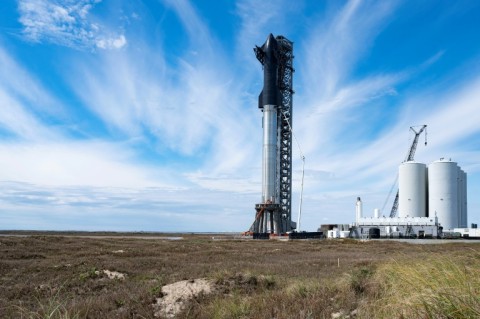 A prototype of Starship, a huge rocket made by SpaceX, sits on a launchpad in Boca Chica, Texas in February 2022