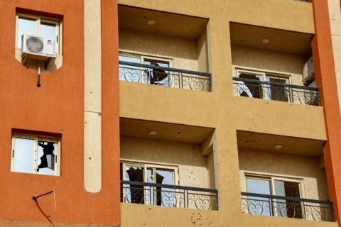 Broken windows at a residential building in Khartoum in the aftermath of fighting