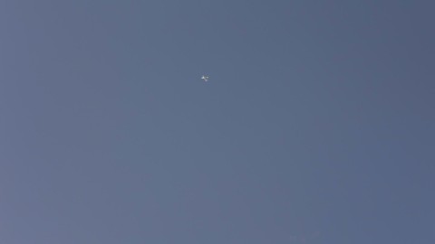 Images of smoke, reconnaissance aircraft flying over Khartoum