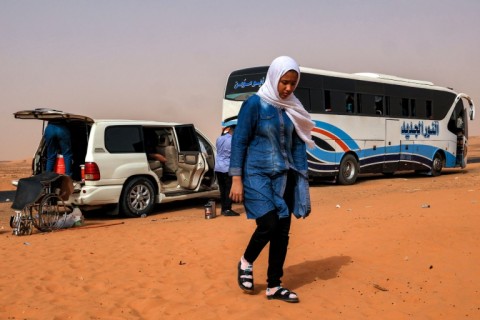 A rest stop on the route which thousands are trying to take north, at al-Gabolab in Sudan's Northern State