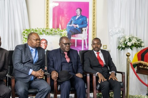 Job Sikhala (left) at the lying in state of Zimbabwe's late president Robert Mugabe in 2019