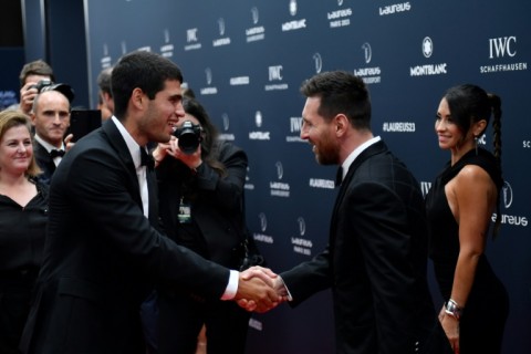 Lionel Messi meets another Laureus award winner Carlos Alcaraz (left) 