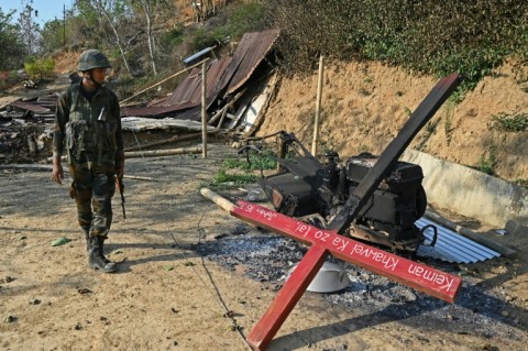 The towering village church, a school building, and even a jackfruit tree were set on fire by the attackers