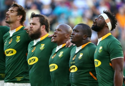 South Africa's captain Siya Kolisi (R)