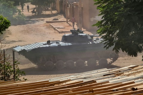 A Sudanese army armoured vehicle is stationed in southern Khartoum, after the latest ceasefire announcement