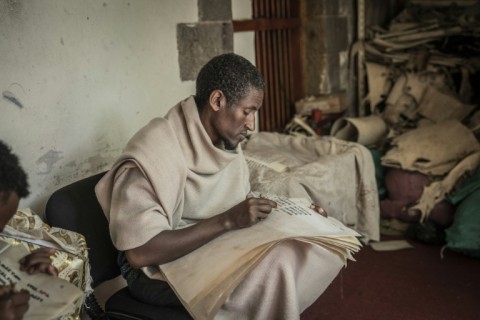 Zelalem Mola says recreating the ancient manuscripts brings him closer to God 