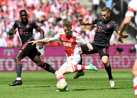 Bayern sealed an 11th straight Bundesliga title with a 2-1 win over Cologne