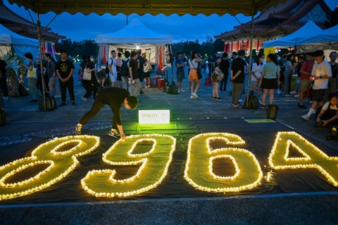 Hundreds commemorated the 34th anniversary of the Tiananmen Square crackdown in Taipei's Liberty Square