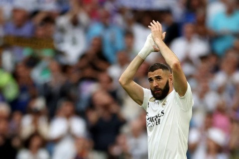 Karim Benzema applauds as he is substituted during his final appearance for Real Madrid