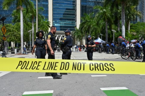 A demonstrator outside the Miami courthouse where Donald Trump was to due be arraigned 