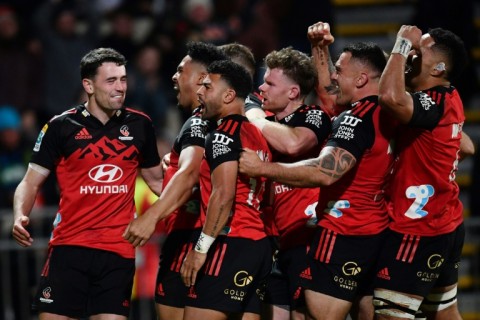 The Crusaders celebrate after a try by Leicester Fainga'anuku (second from left) in Friday's Super Rugby Pacific semi-final win over the Blues