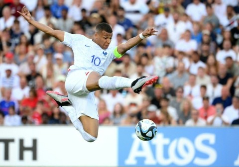 Paris Saint-Germain's France forward Kylian Mbappe in action in a Euro 2024 qualifier against Gibraltar in Faro on June 16