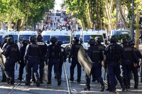 A burned car on Saturday in the Paris suburb of Nanterre, where Nahel lived and was killed