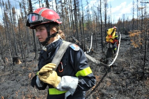 French firefighters battle wildfires in the Abitibi-Temiscamingue region of Canada's Quebec province, in an image released July 3, 2023