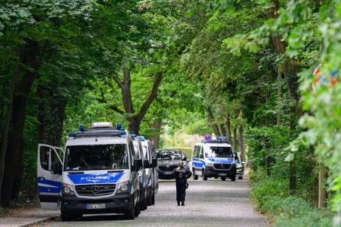 Police officers in Stahnsdorf, southwest of Berlin, take part in the search for a wild animal thought to be an escaped lioness