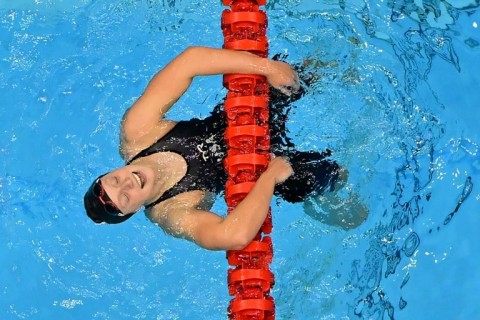 Swimming great Katie Ledecky carved her name deeper into the sport's history