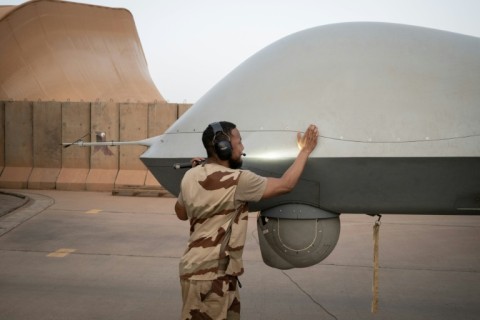 A French soldier checks a Reaper drone at the French base in Niamey in May. France has 1,500 troops in Niger under its anti-jihadist mission in the Sahel