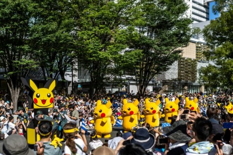 A parade of Pikachus, the most popular Pokemon character, welcome visitors to the game's first-ever championship held in Japan