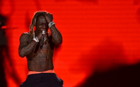 Lil Wayne had the monster crowd on its feet at Yankee Stadium, which hosted an enormous birthday party for hip-hop's 50th year