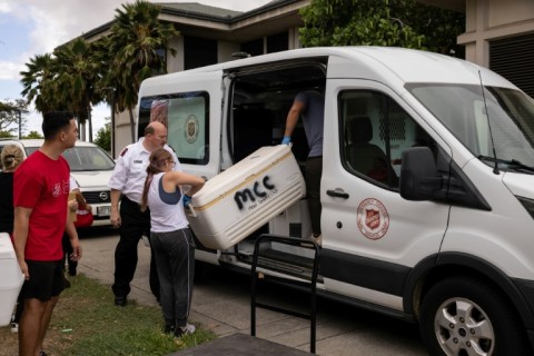 Members of the Salvation Army and other volunteer networks pick up the food, which arrives at shelters and in Lahaina still warm