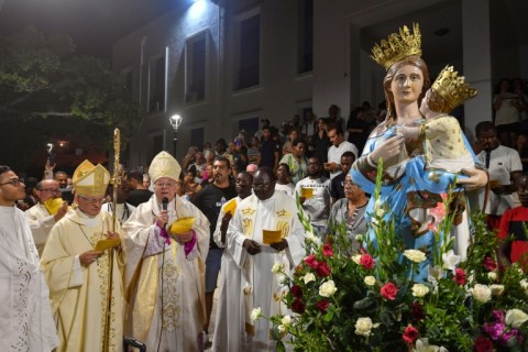 Each year the Virgin Mary figurine has been carried slightly farther from Tunisia's oldest church during the Feast of the Assumption procession