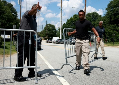 Fulton County Sheriff officers put up fencing near an entrance to the Fulton County Jail -- where Donald Trump is expected to surrender --  on August 21, 2023 in Atlanta, Georgia