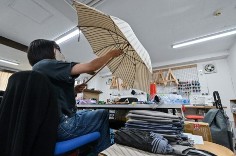 The family business has found a niche in making 'luxury' umbrellas, building a slick-looking website and social media presence extolling their skills