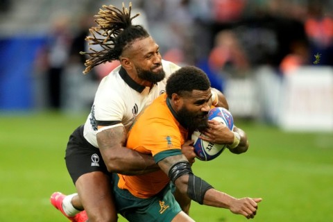 Fiji captain Waisea Nayacalevu tackles 
Australia's Marika Koroibete in Fiji's stunning victory over the Wallabies at the World Cup