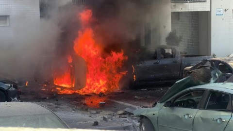 Car on fire after rocket strike in Israel's Ashkelon