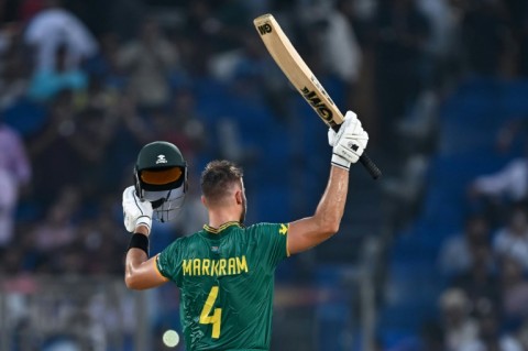 Record breaker: South Africa's Aiden Markram celebrates after scoring a century off 49 balls against Sri Lanka 