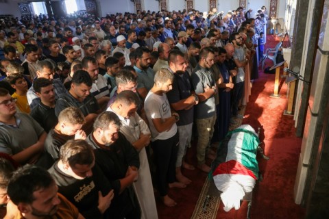 Mourners attend the funeral of Hamas senior figure Zakaria Muammar, who was killed in an Israeli strike, in Khan Yunis, the Gaza Strip