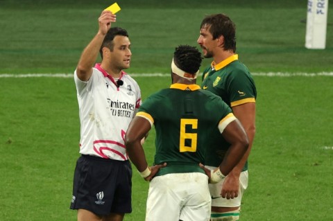 South Africa lock Eben Etzebeth (R) is shown a yellow card by Ben O’Keeffe (L) during the thrilling win over France