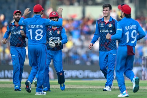 Star is born: Afghanistan's Noor Ahmad (2nd right) celebrates after taking the wicket of Pakistan captain Babar Azam 