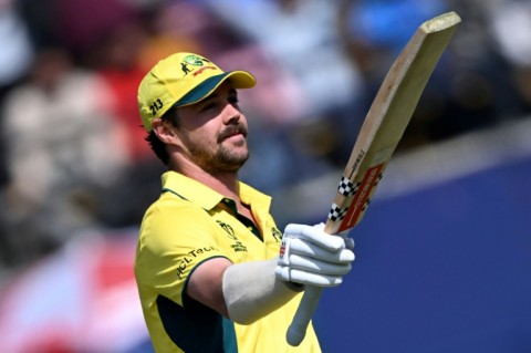 Head of the class: Australia's Travis Head celebrates after scoring his century on Saturday