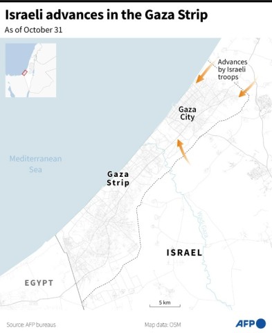 Palestinians search for survivors in the rubble of a refugee camp