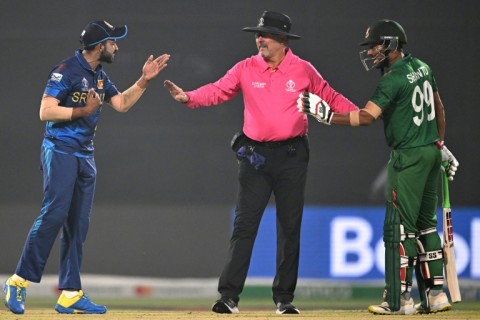 Flashpoint: Sri Lanka's Sadeera Samarawickrama (left) and Bangladesh's Najmul Hossain Shanto have to be separated by the umpire in Monday's tense clash