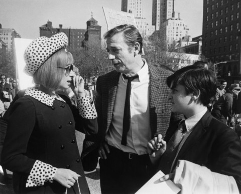 US actress Barbra Streisand speaks with French actor Yves Montand (C) during the filming of "On a Clear Day You Can See Forever" directed by Vincente Minnelli in New York on May 9, 1969