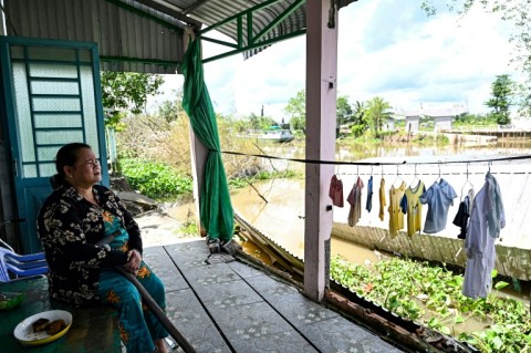 In addition to taking a toll on infrastructure, riverbank erosion has hit everyday residents like Le Thi Hong Mai