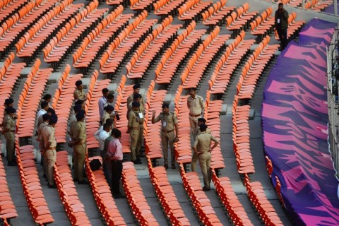 Keeping watch: Police attend a briefing at the Narendra Modi Stadium in Ahmedabad 