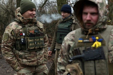 The winter strips foliage from branches, exposing the troops to Russian drone cameras