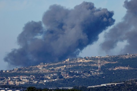 Smoke billows following an Israeli bombardment of hills close to the town of Marwahin in southern Lebanon