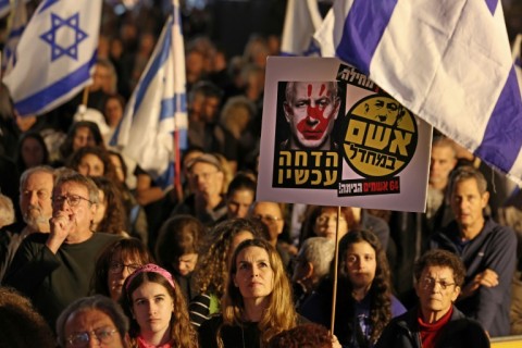 Netanyahu was under growing pressure on Saturday with demonstrators gathering in Tel Aviv's Habima Square to call for early elections